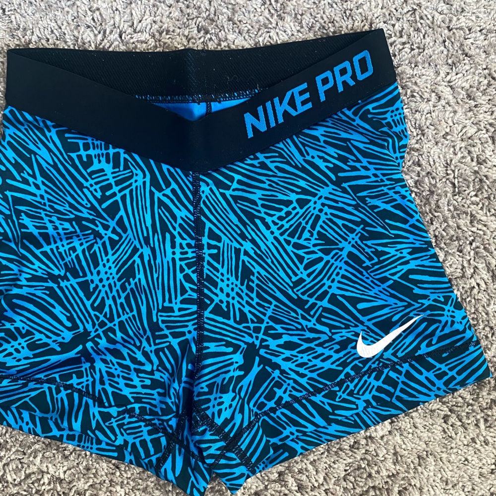 Blue Nike pros